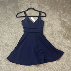 brand new with tags , dress is too small but still really cute